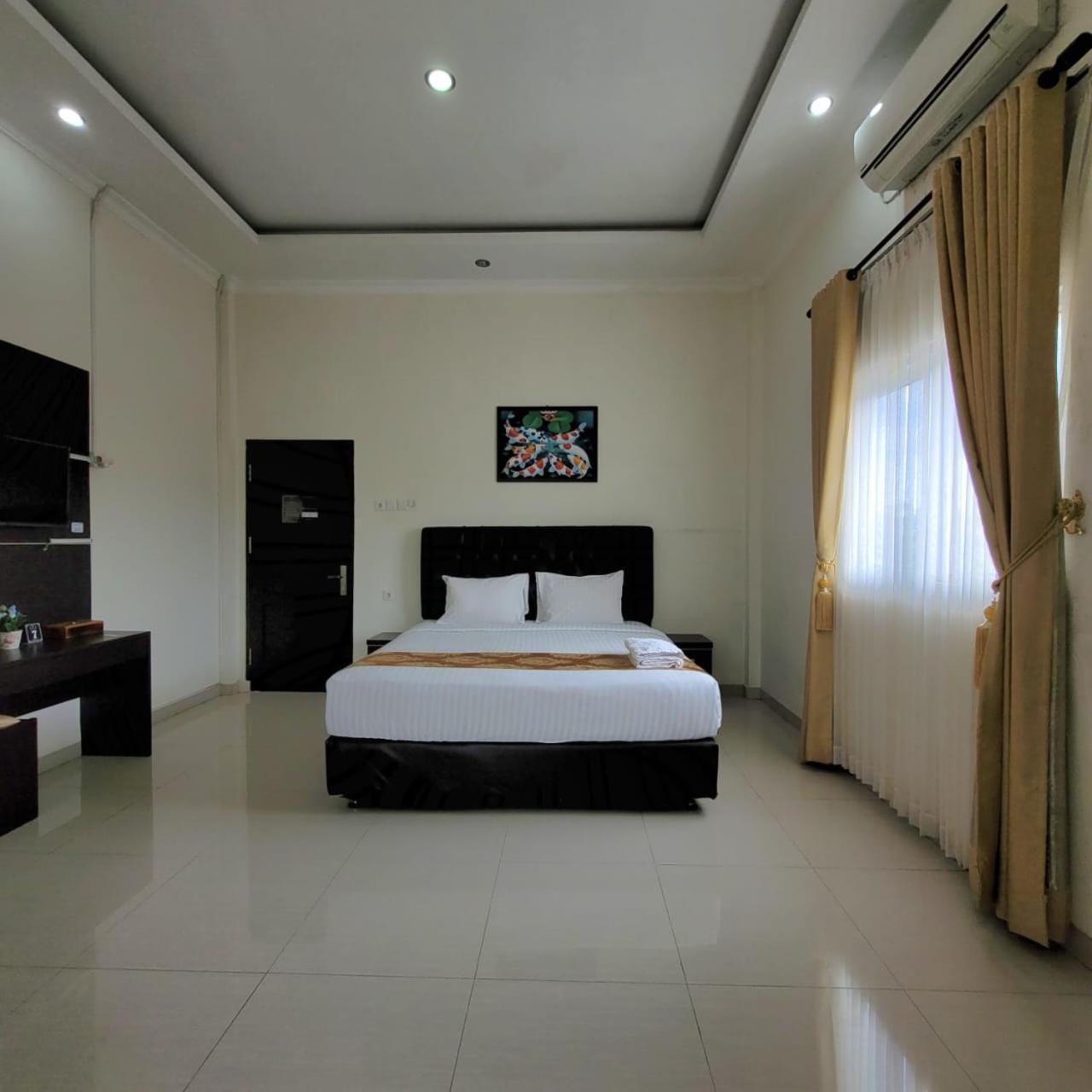 פדאנג Mahakam Guest House חדר תמונה