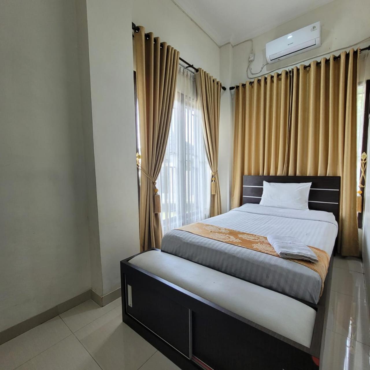 פדאנג Mahakam Guest House חדר תמונה