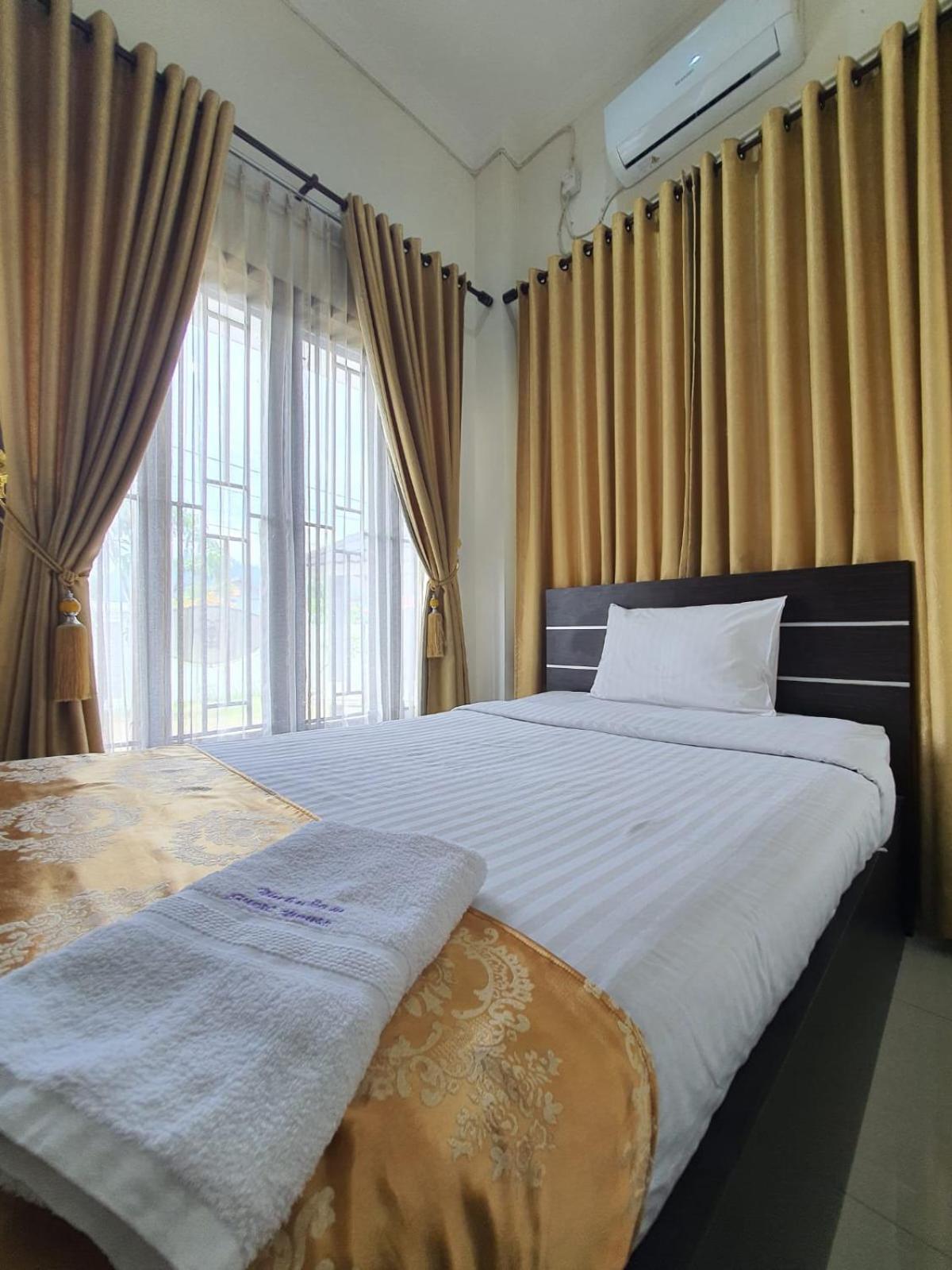 פדאנג Mahakam Guest House חדר תמונה